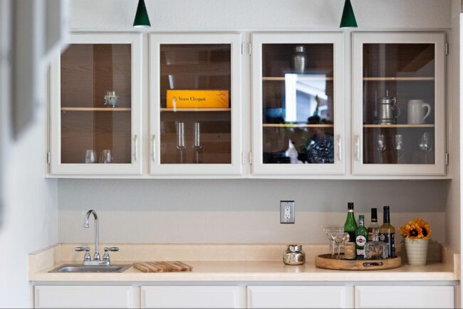A detailed, intentional counter shot and kitchen cupboard